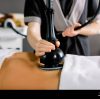 lymphatic-drainage-massage-device-anti-cellulite-body-correction-cropped-image-of-woman-client-receiving-vacuum-massage-of-the-abdomen-and-hands-of-2ANTPX2-transformed